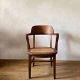 Solid oak and cane armchair
