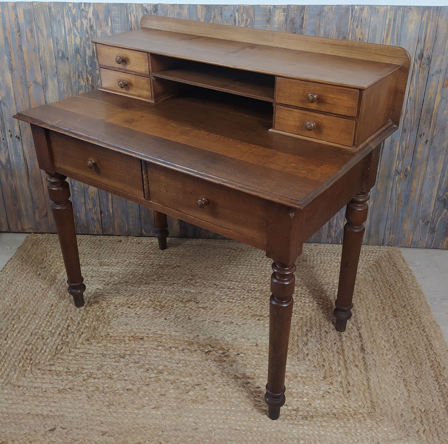 Wooden desk with turned feet
