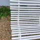 Old garden bench with metal legs and wooden slats