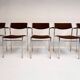 Set of 6 stackable chairs in rust colour by Gijs van der Sluis, 1970s.