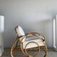 Large rattan rest chair and white cushions