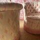 Pair of vintage 1970s cabriolet armchairs in Hollywood Regency style with satin pink upholstery.
