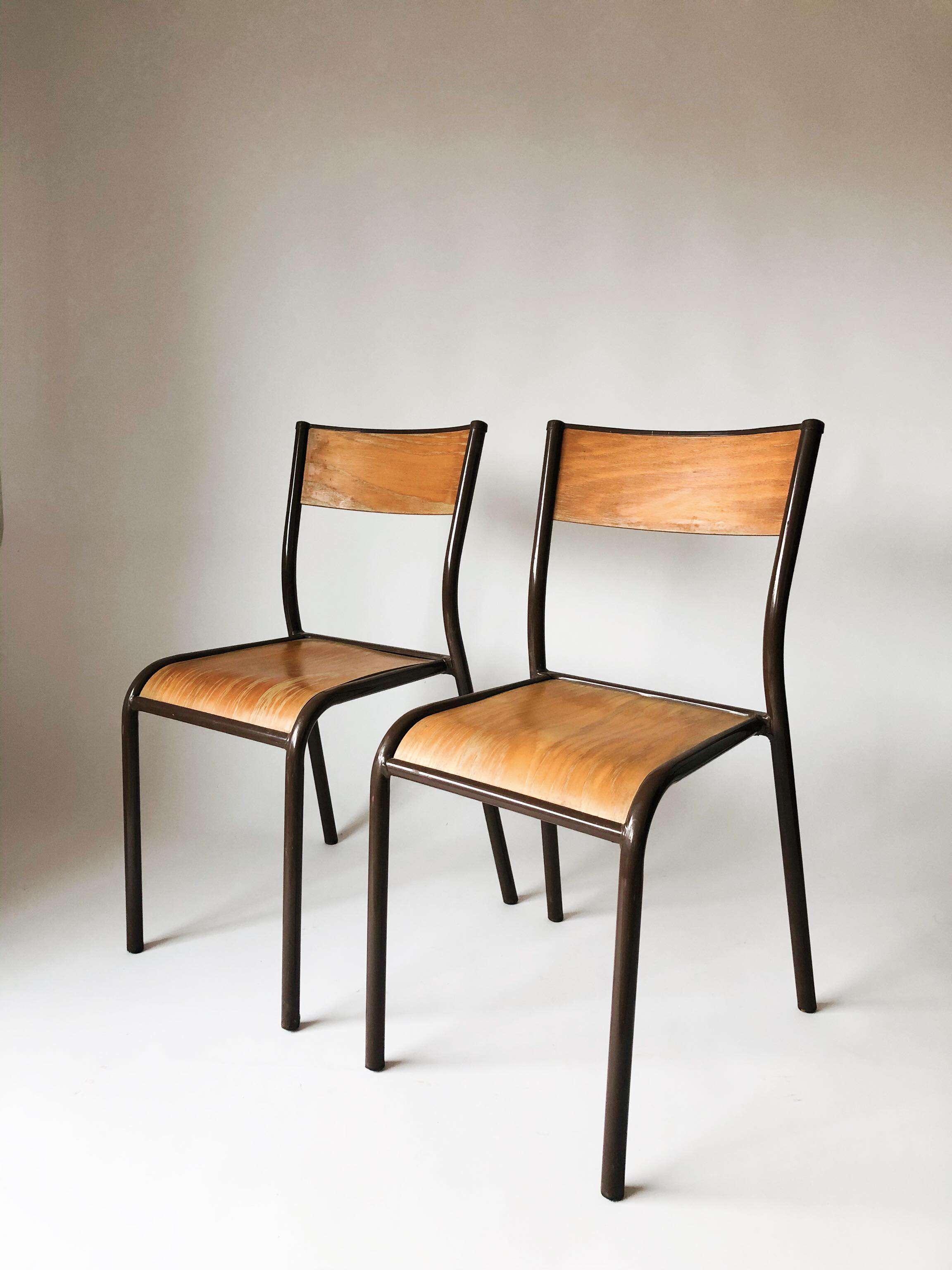 Pair vintage school chairs