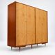 Vintage 4-door wardrobe / linen cabinet from the 1960s or 70s