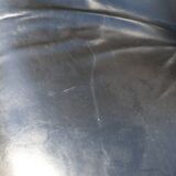 Pollock black leather reclining armchair with fixed ends