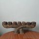 Hand-carved wooden candle holder, ethnic tribal style.