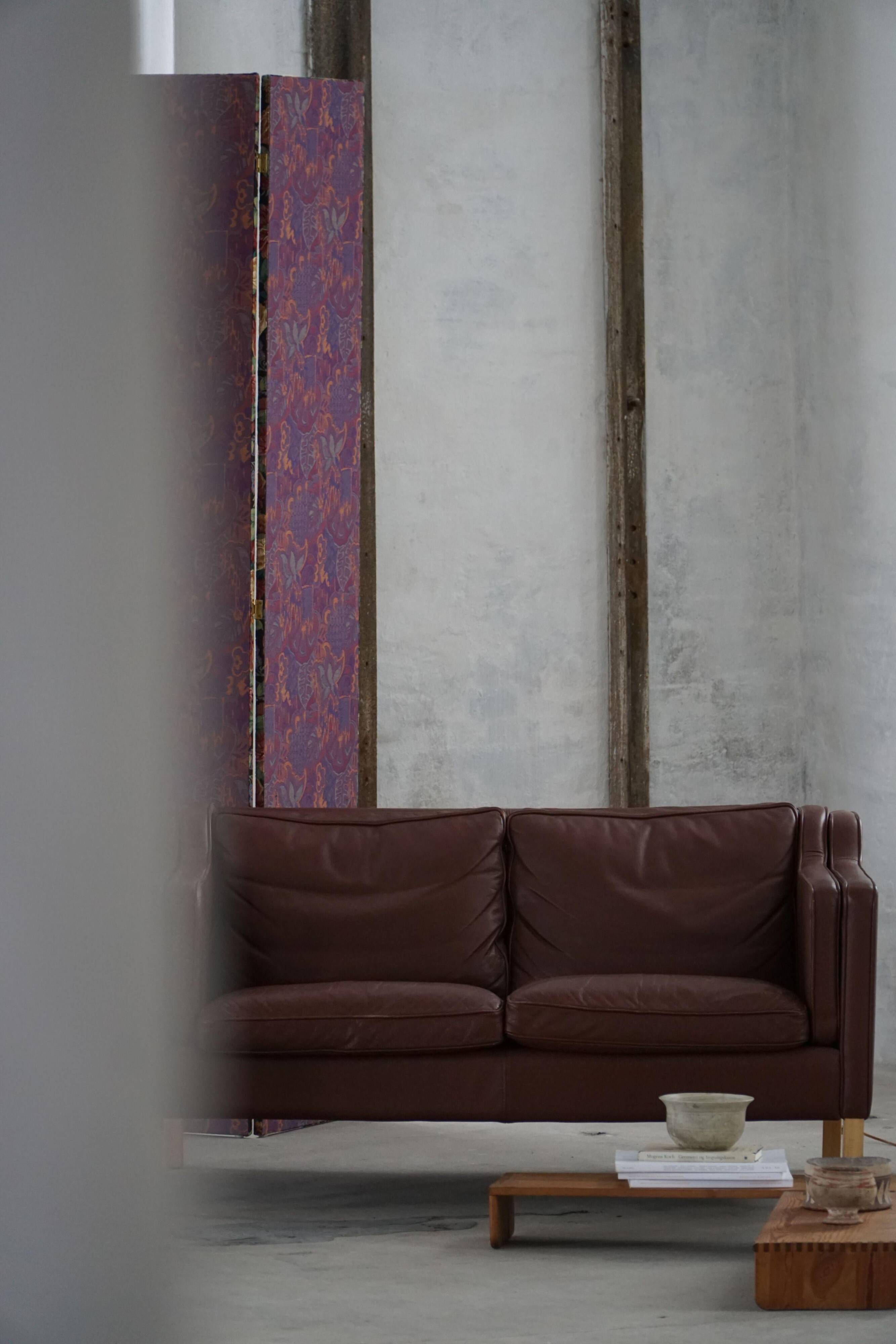 Stouby Møbelfabrik, two-seater sofa in mid-century style in brown leather, 1970s.