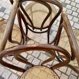 Wooden and cane bistro chairs