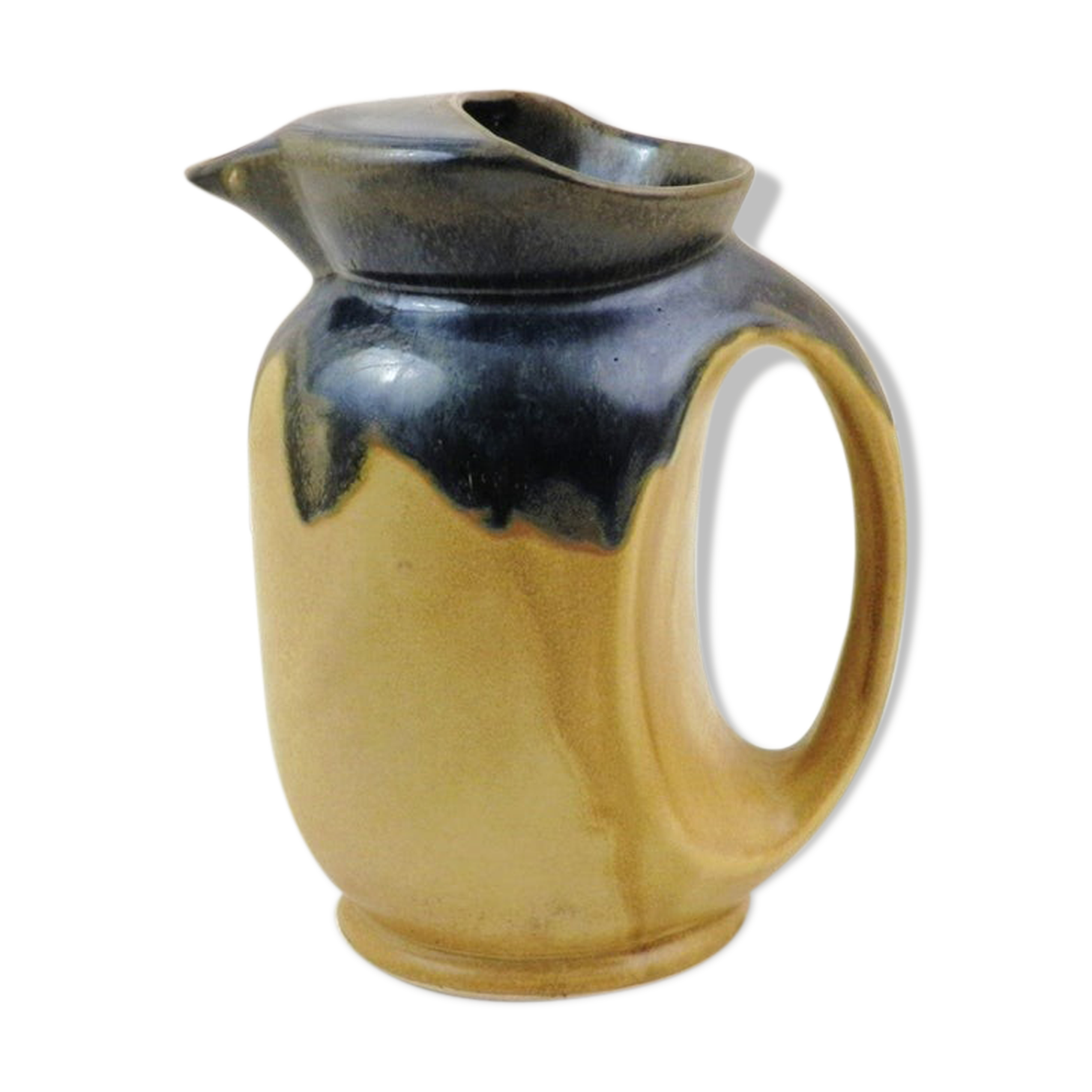 Vintage art deco water pitcher with drippy dark blue glaze.