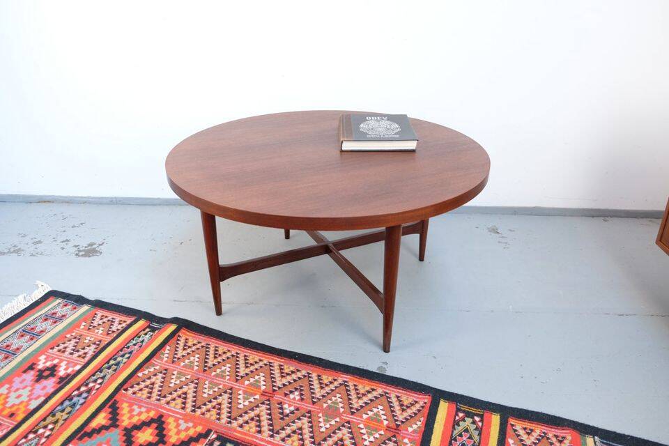 Vintage teak coffee table in 60s-70s style, retro style.