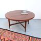 Vintage teak coffee table in 60s-70s style, retro style.