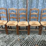 8 Chaises  anciennes vendéennes paillées en cerisier massif.