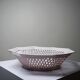Pale pink woven octagonal porcelain bowl, circa 1950.