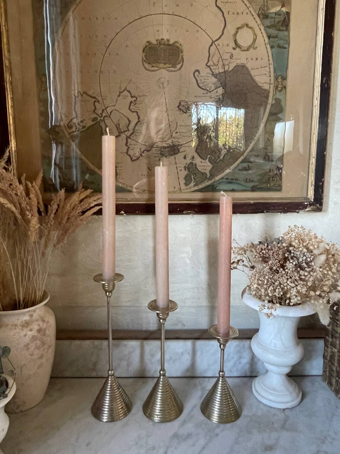 Set of three vintage brass candle holders