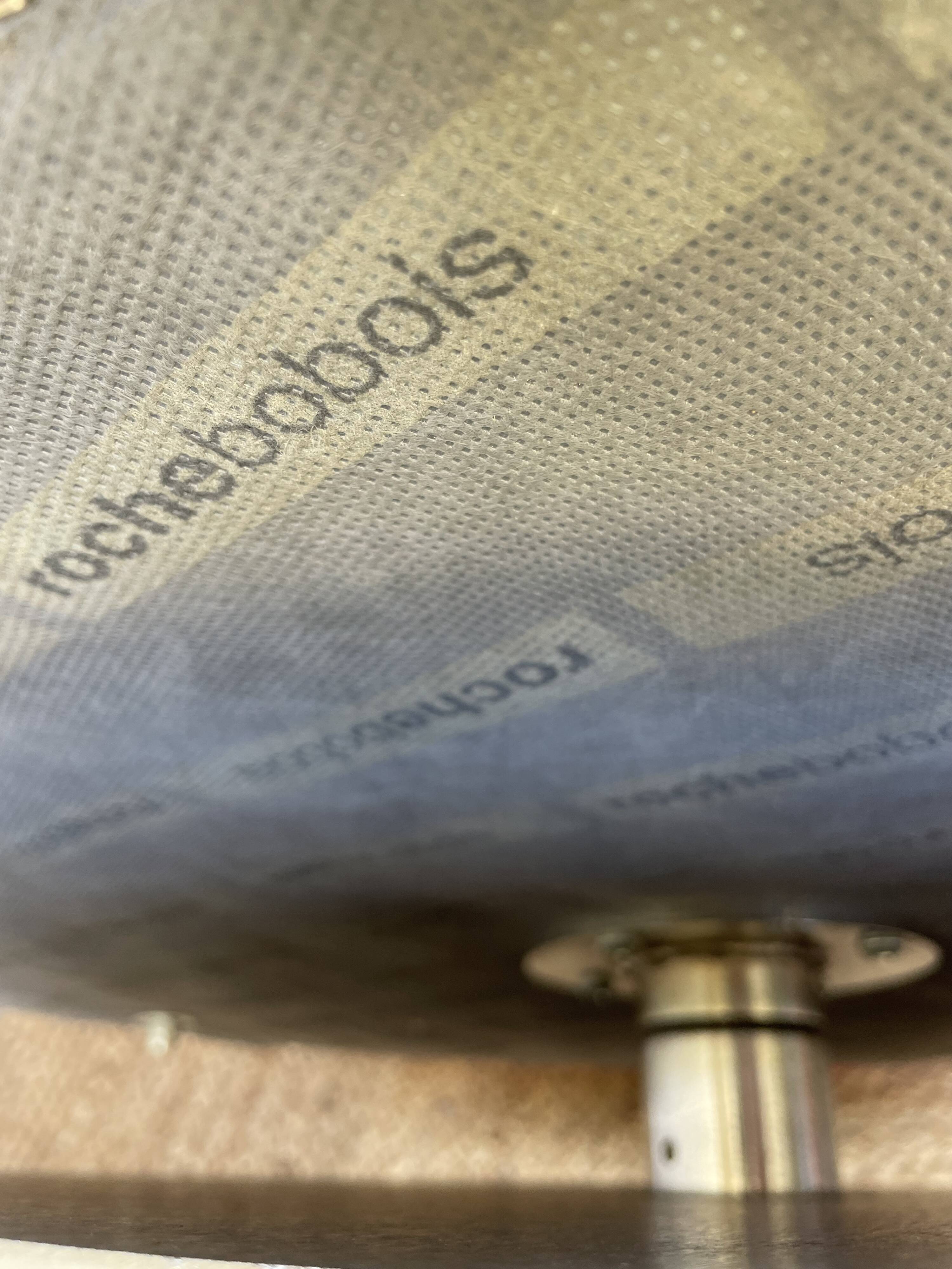 Curl armchair in red leather by Roche Bobois