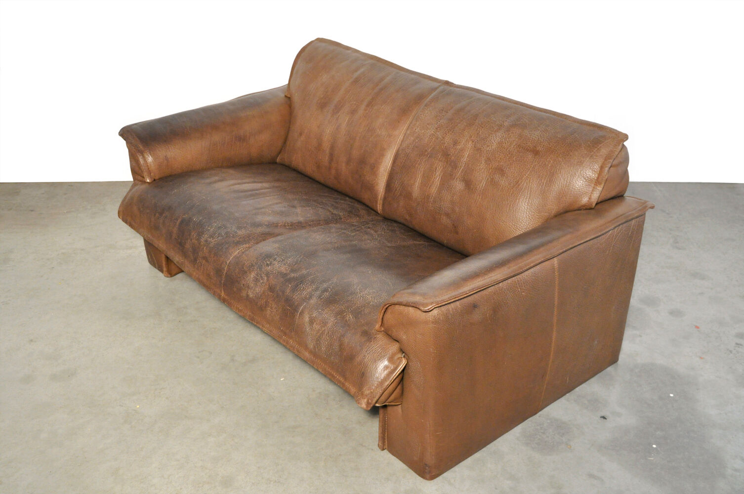 Neck leather 2-seater sofa by Hugo de Ruiter for Leolux, 1970s Netherlands