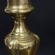 Pair of gilded bronze candlesticks from the Regency period, 18th century.