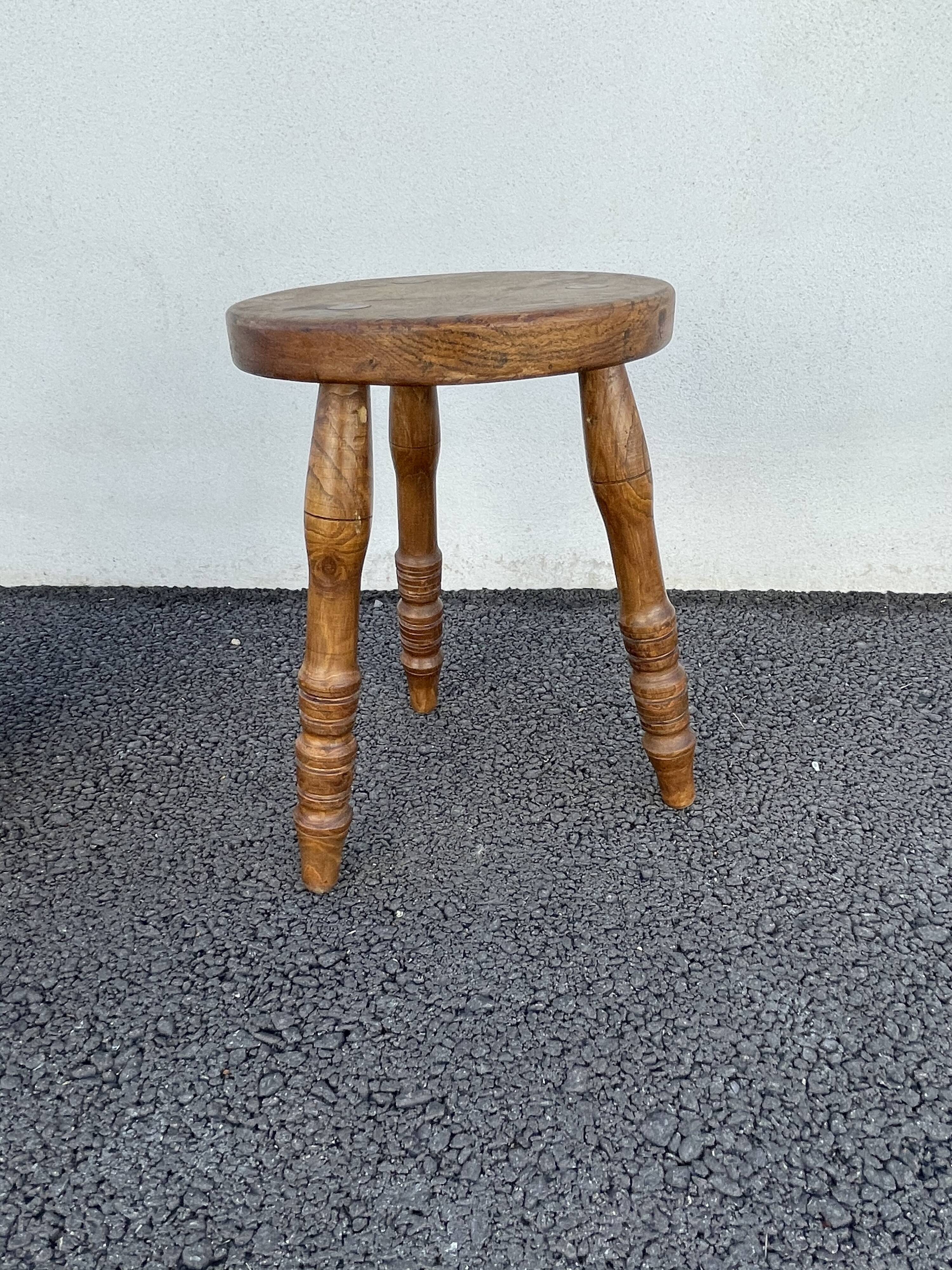 Wooden tripod stool