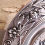 Repelled pewter wall clock floral decoration