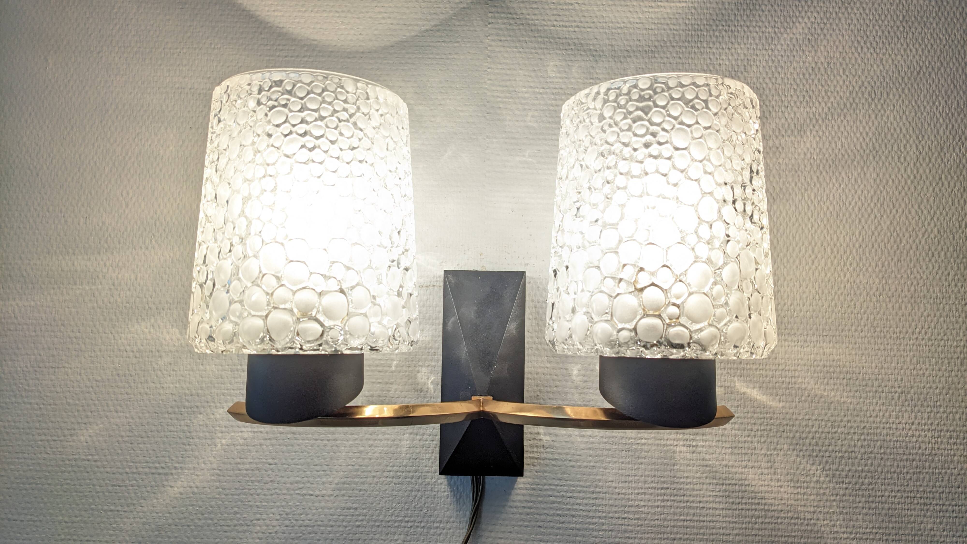 Pair of double wall lights in bubbled glass by Maison Arlus, France circa 1960.