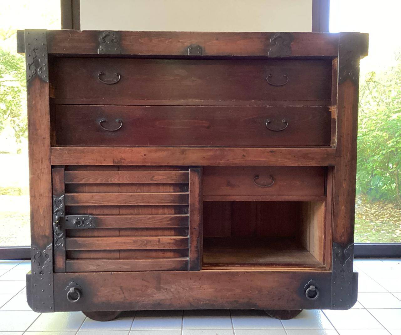 Japanese antique wooden chest with black fittings.