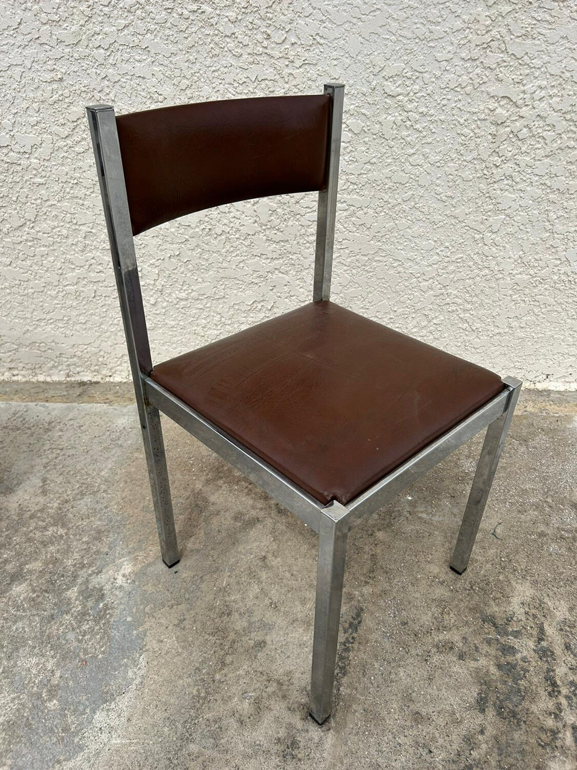 4 vintage leather/iron chairs