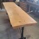 Large bistro table with a wooden top and cast iron legs - 2m56