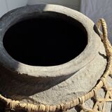 Immense light grey antique-style pot with a crosshatch lid and handles.