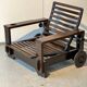 Wooden armchair with ottoman 1965