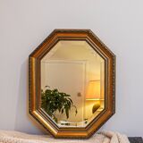 Octagonal gold wall mirror, molded frame