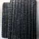 Duo of black wicker baskets