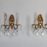 Pair of antique 2-light wall sconces in bronze with crystal pendants, Spain.
