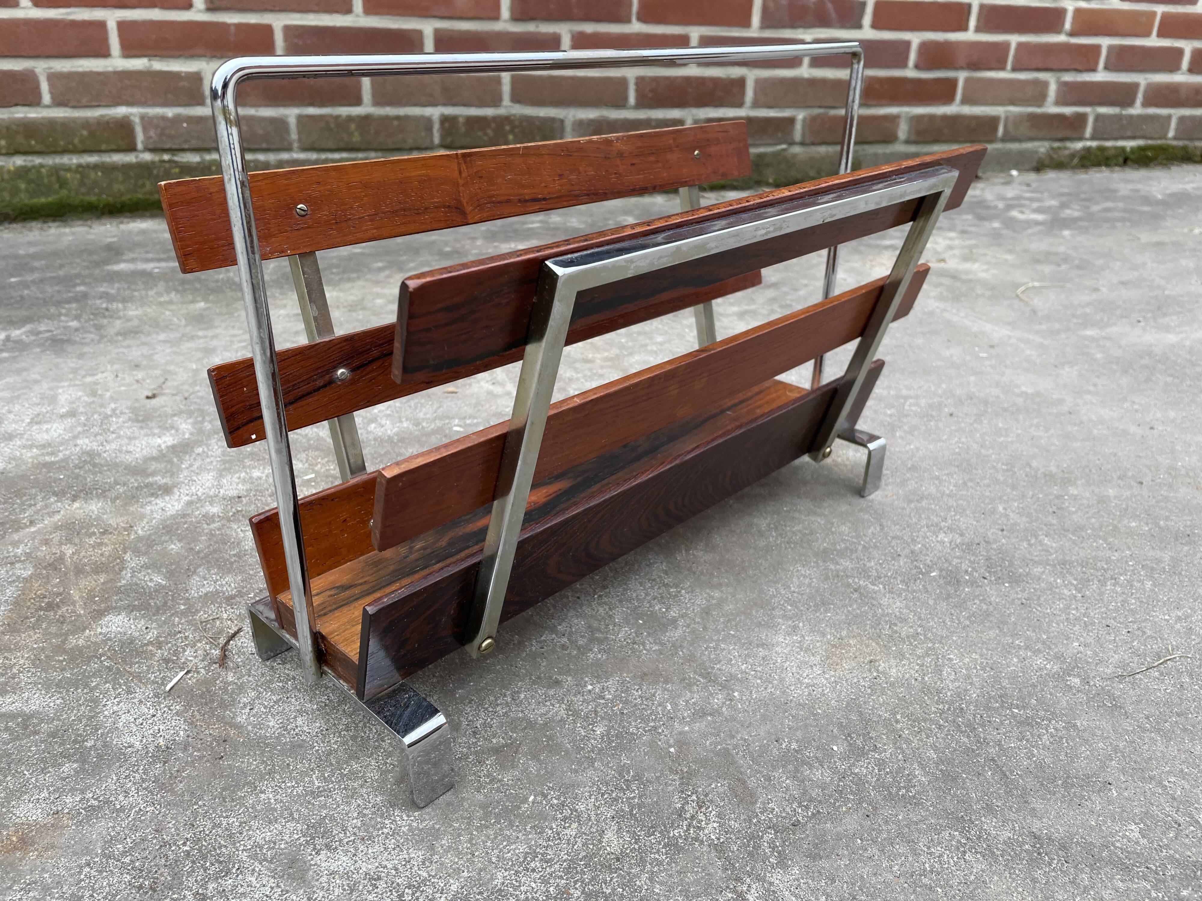 Vintage magazine rack from  rosewood and chrome design