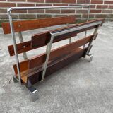 Vintage magazine rack from  rosewood and chrome design