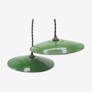 Trio of green enamelled sheet metal hanging lamps