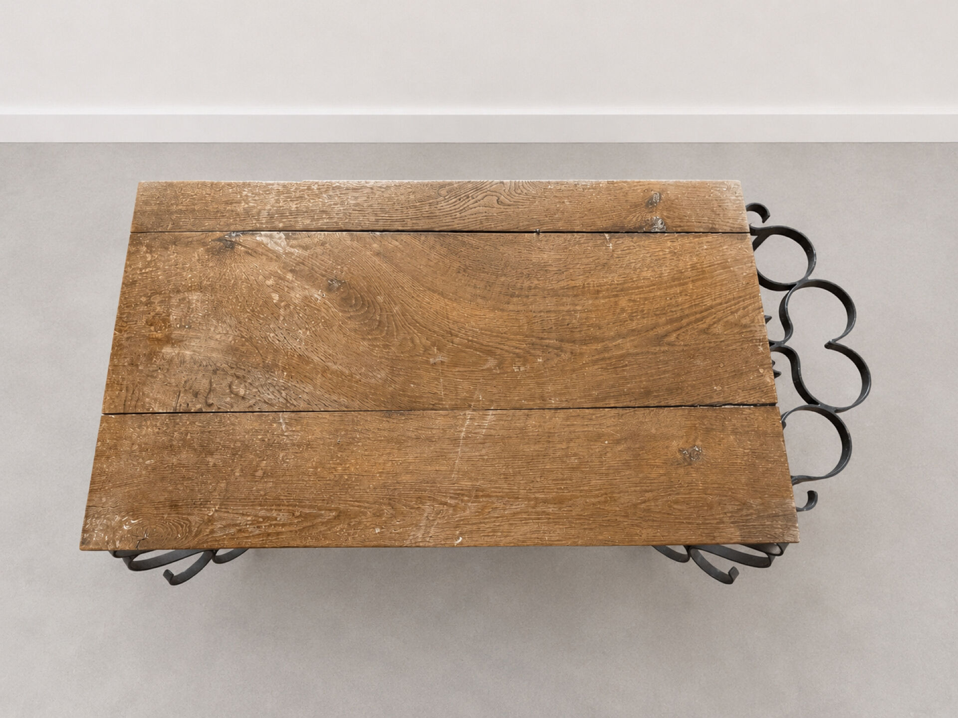 Antique solid wood coffee table with integrated wine rack.