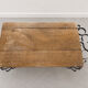 Antique solid wood coffee table with integrated wine rack.