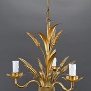 Golden suspension on ears of wheat, circa 1960