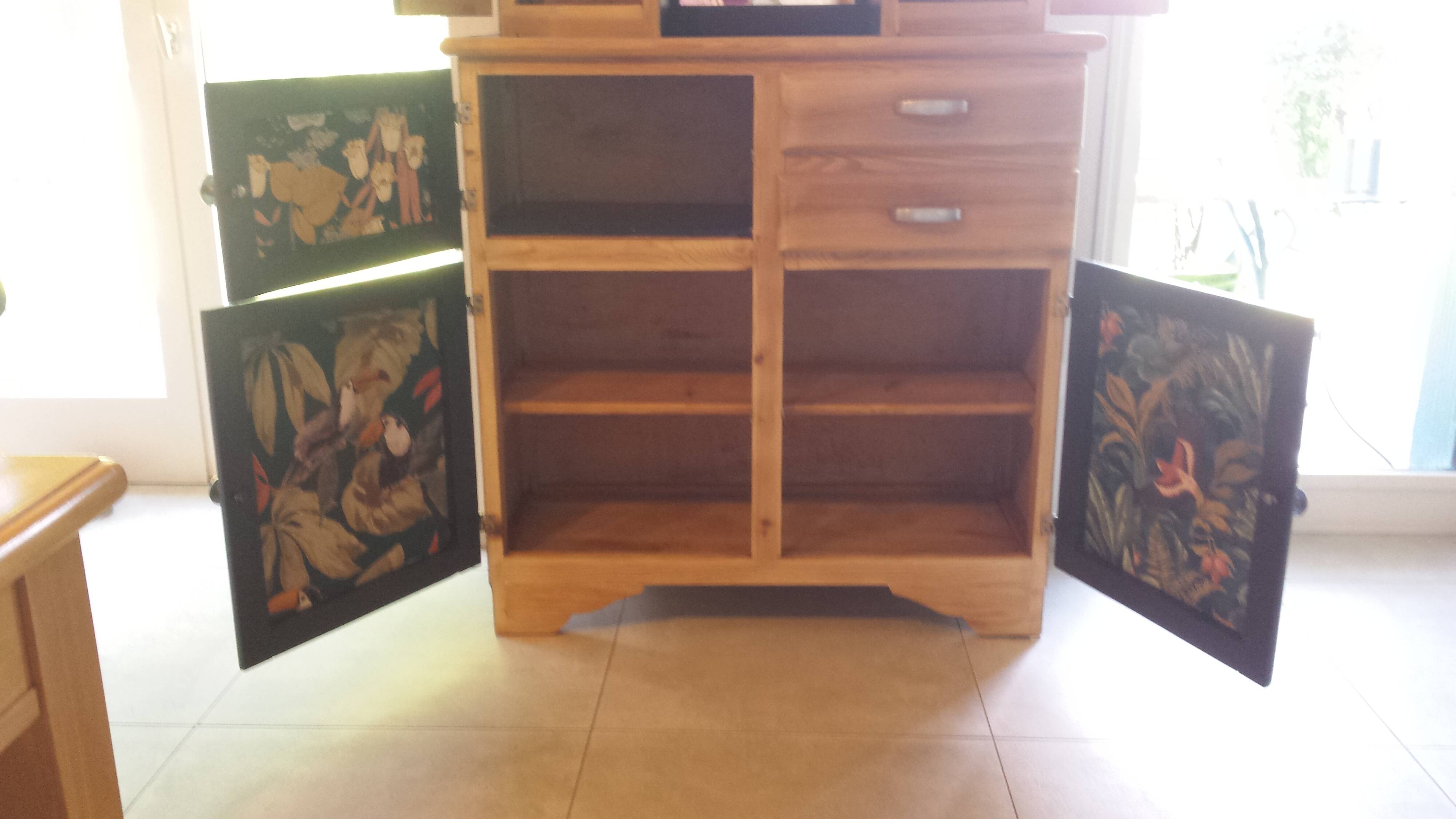 Vintage wooden buffet with a marble top.