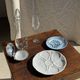 Vintage silver-plated shell butter dish with transparent bowl.