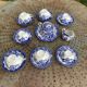 Coffee service composed of 17 pieces, in blue and white porcelain, cherry blossom patterns