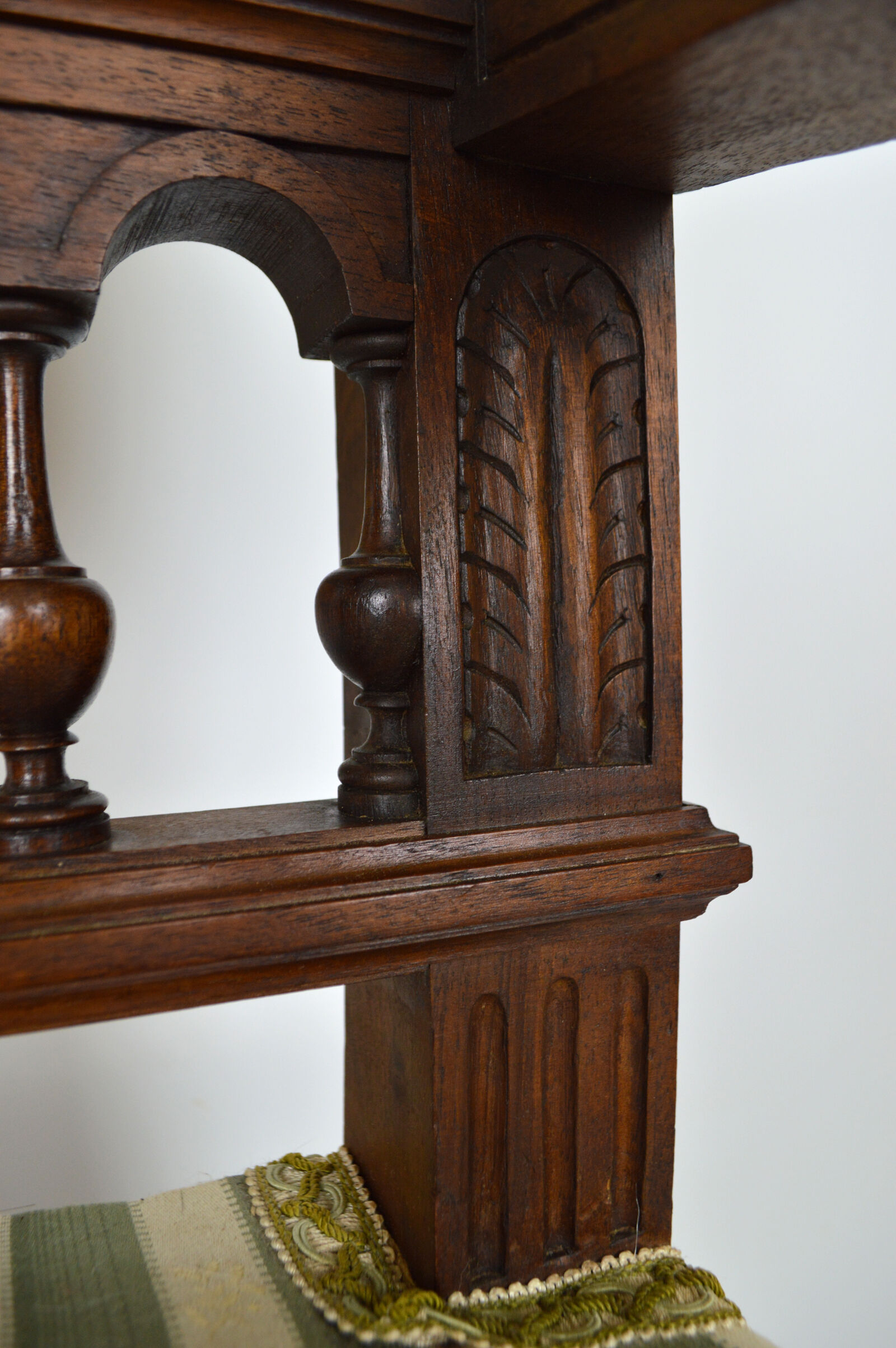 Neo-Renaissance walnut armchair with lion heads, circa 1880