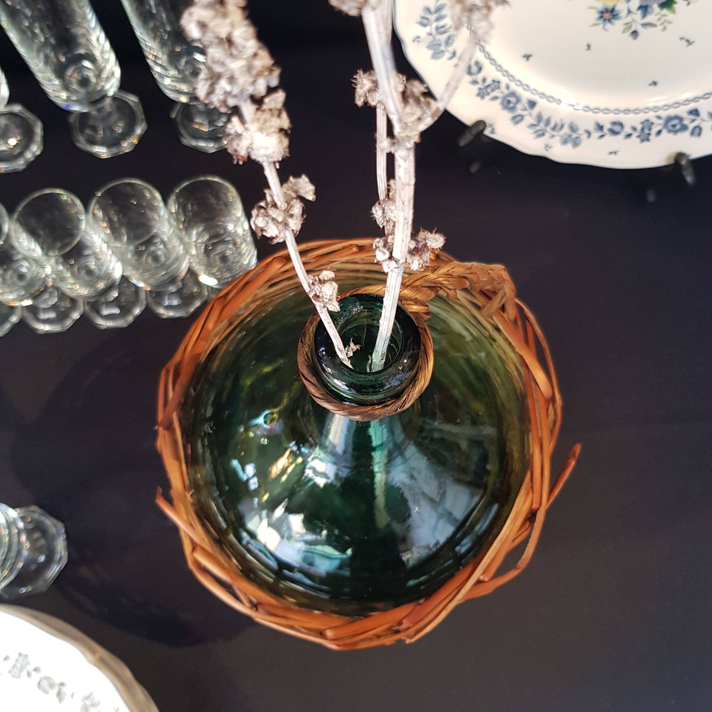 glass and rattan bottle