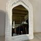 White rattan bedroom set: chest of drawers, mirror, bed, basket