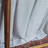 Old frame in wood and gilded stucco