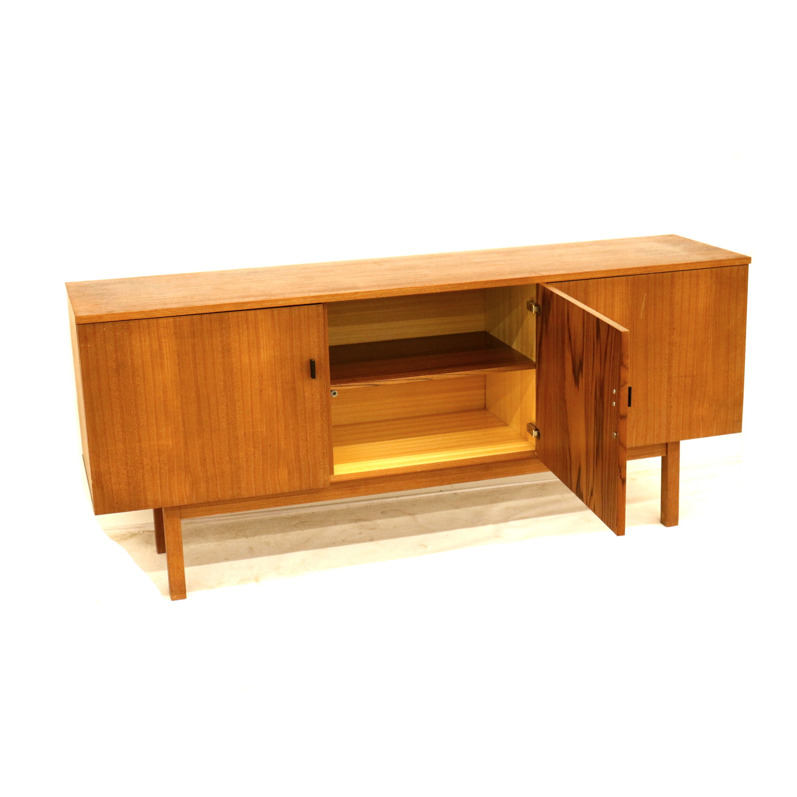 Vintage teak sideboard with doors and drawer made in the 1960s
