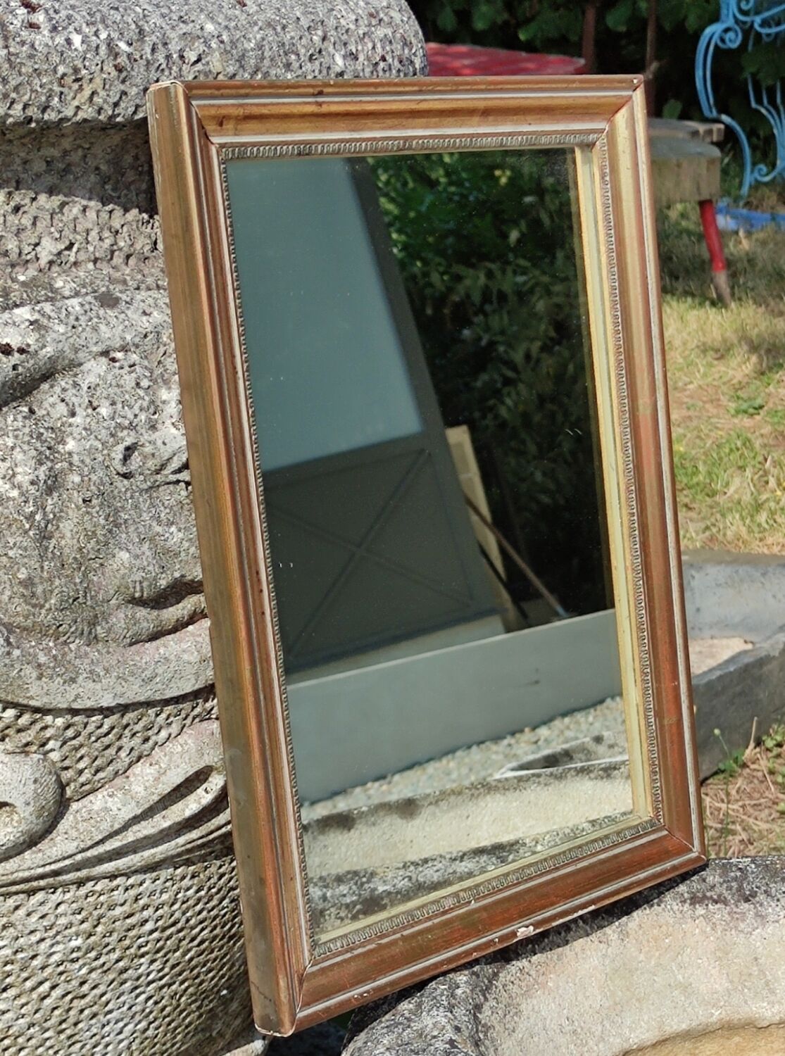 Old little gilded mirror
