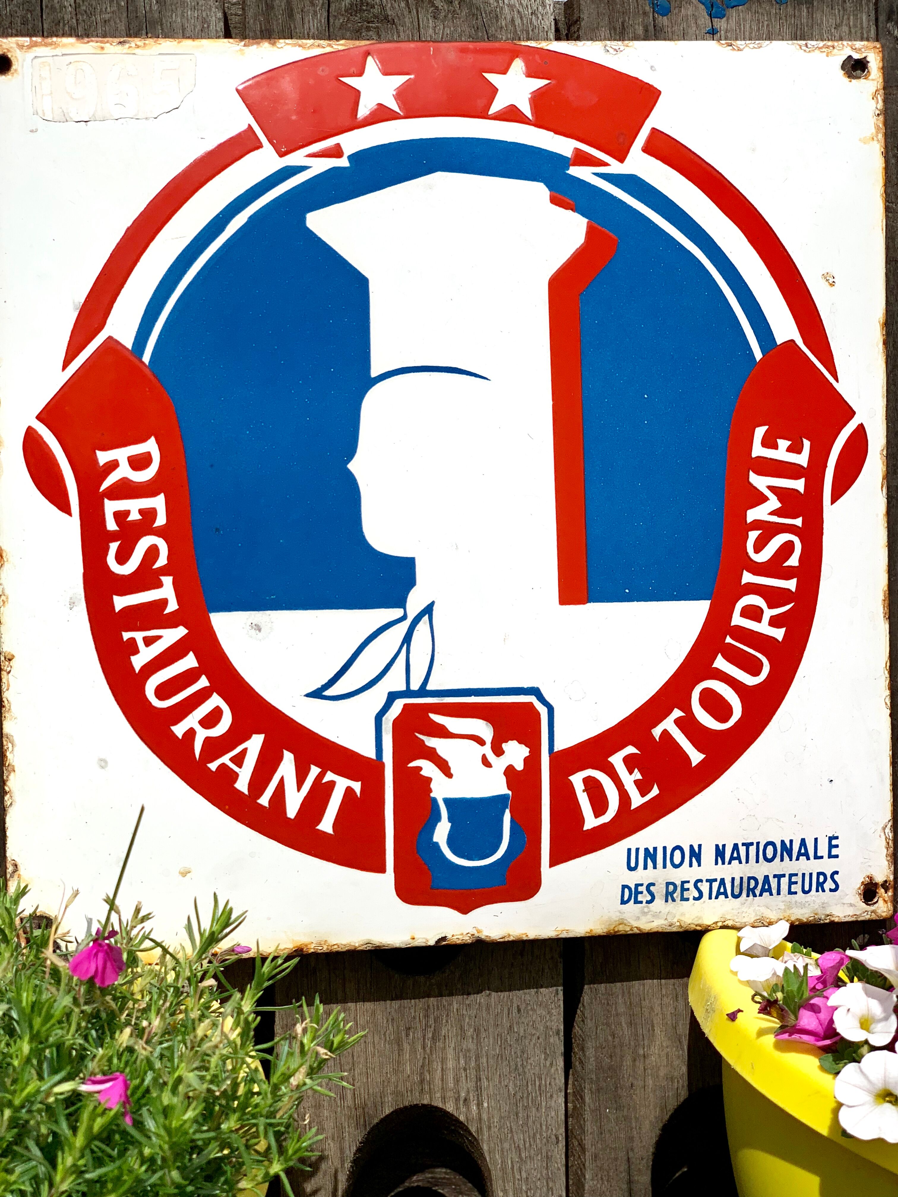 Old enamelled plate tourist restaurant