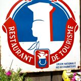 Old enamelled plate tourist restaurant