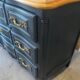Black and wood chest of drawers